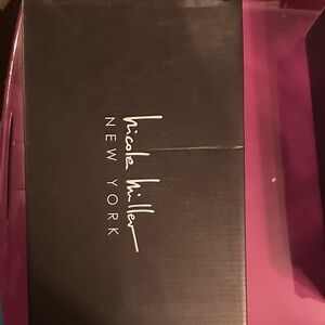 Nicole Miller natural fuzzy slide